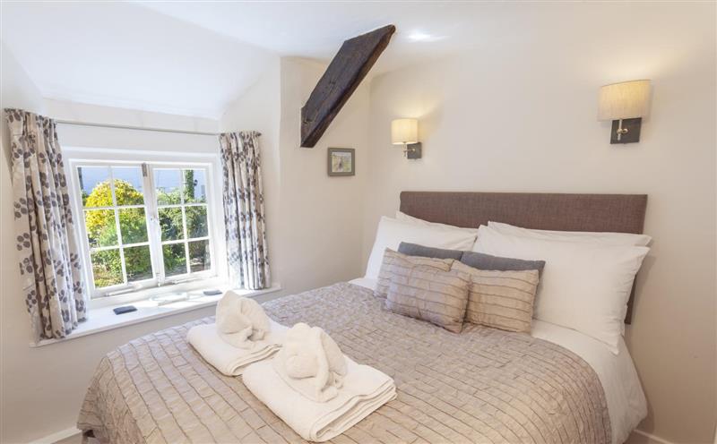 This is a bedroom (photo 2) at Syms Cottage, Cutcombe