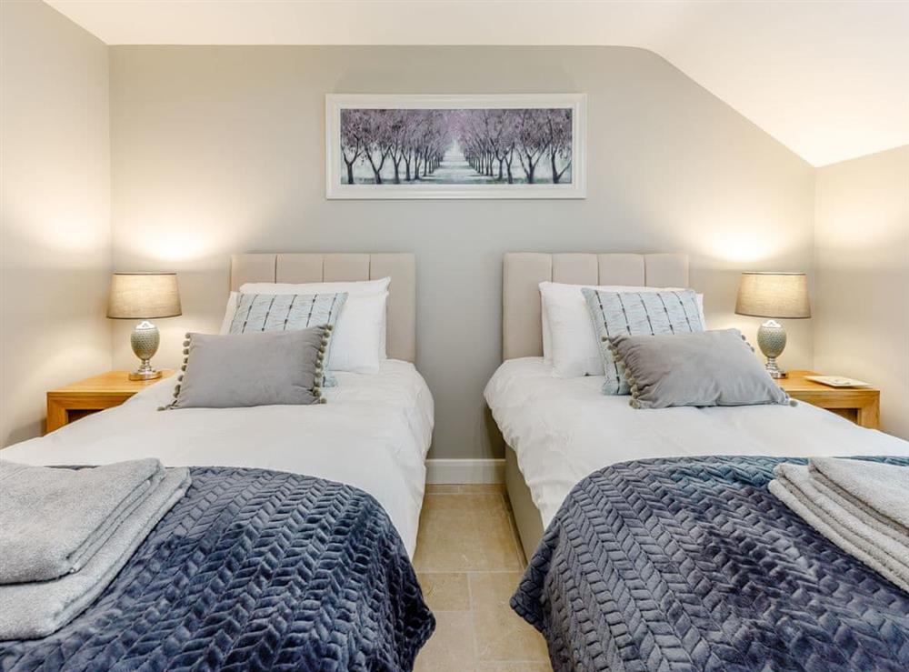 Twin bedroom at Tadpole Cottage in Malpas, Cheshire