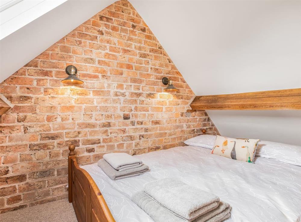Galleried (above bedroom 1) double bedroom at Tadpole Mews at Frog Hall in Tilston, Cheshire