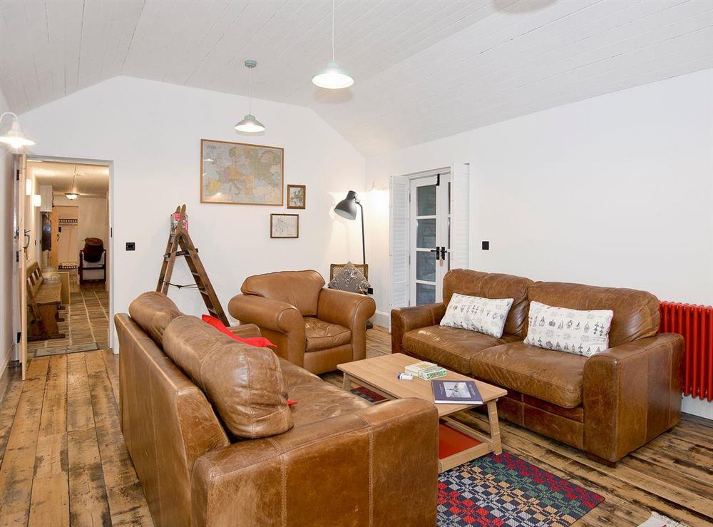 Spacious comfortable living room at Tŷ Cai, 