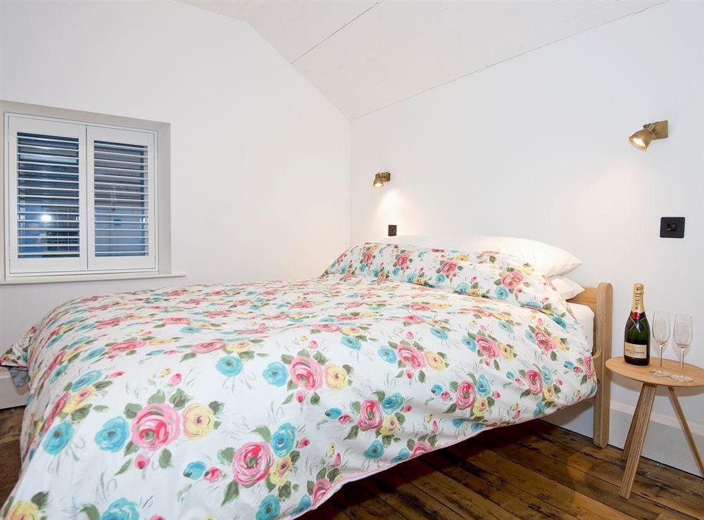 Spacious light and airy double bedroom with luxury welcome pack (photo 3) at Tŷ Cai, 