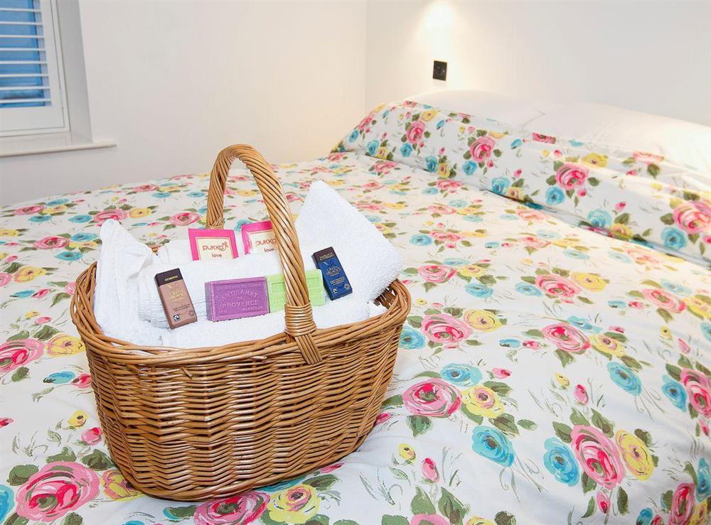 Spacious light and airy double bedroom with luxury welcome pack (photo 4) at Tŷ Cai, 
