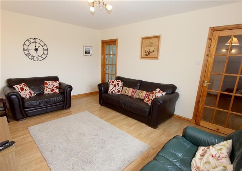 Relax in the living area at Taigh Dhonnchaidh, Peninerine near Creagorry