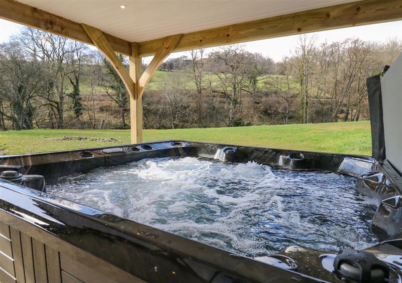 Enjoy the hot tub at Talarddu Cottage, Builth Wells