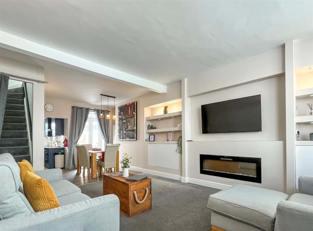 Open plan living space at Taliesin Retreat in Llandudno, Gwynedd