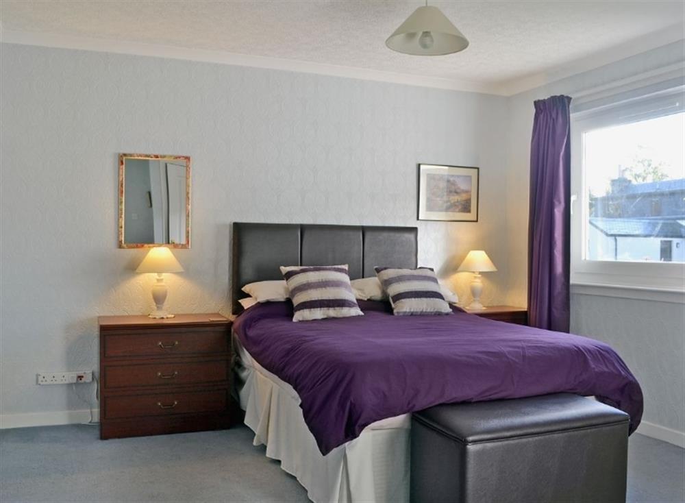 Double bedroom at Tall Pines in Carrbridge, Great Britain