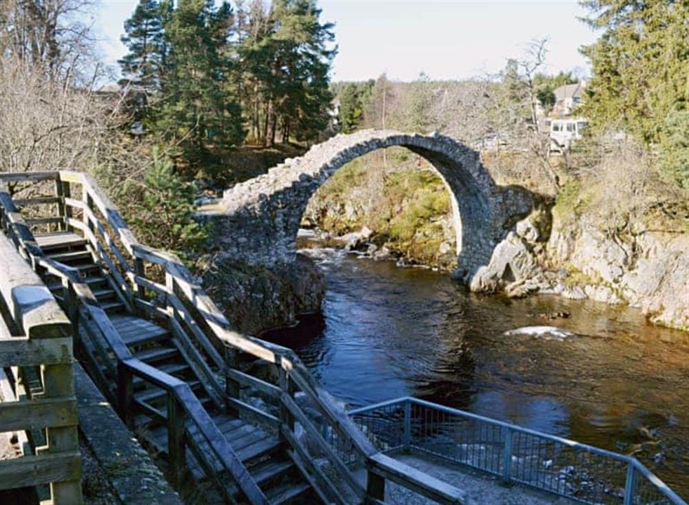 Historic bridge in village centr at Tall Pines in Carrbridge, Great Britain