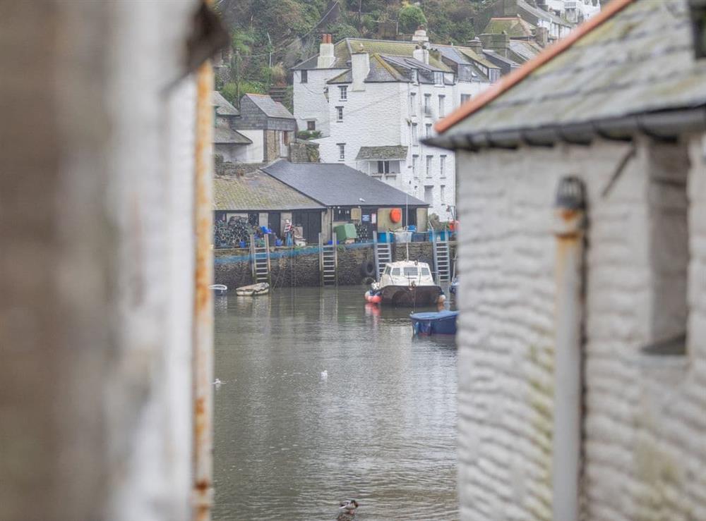 View from property offers a glimpse of the harbour at Talland House in Polperro, near Looe, Cornwall