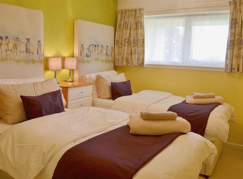 The twin room has matching upholstered bed-heads