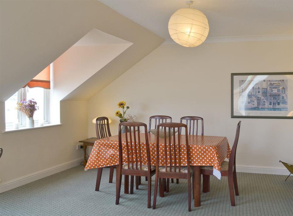 Formal dining area within living room at Tamar View in Cargreen Village, near Plymouth, Devon