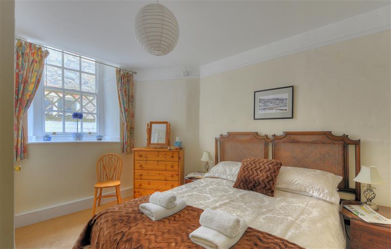 This is a bedroom at Tamarind Tree Apartment, Lyme Regis