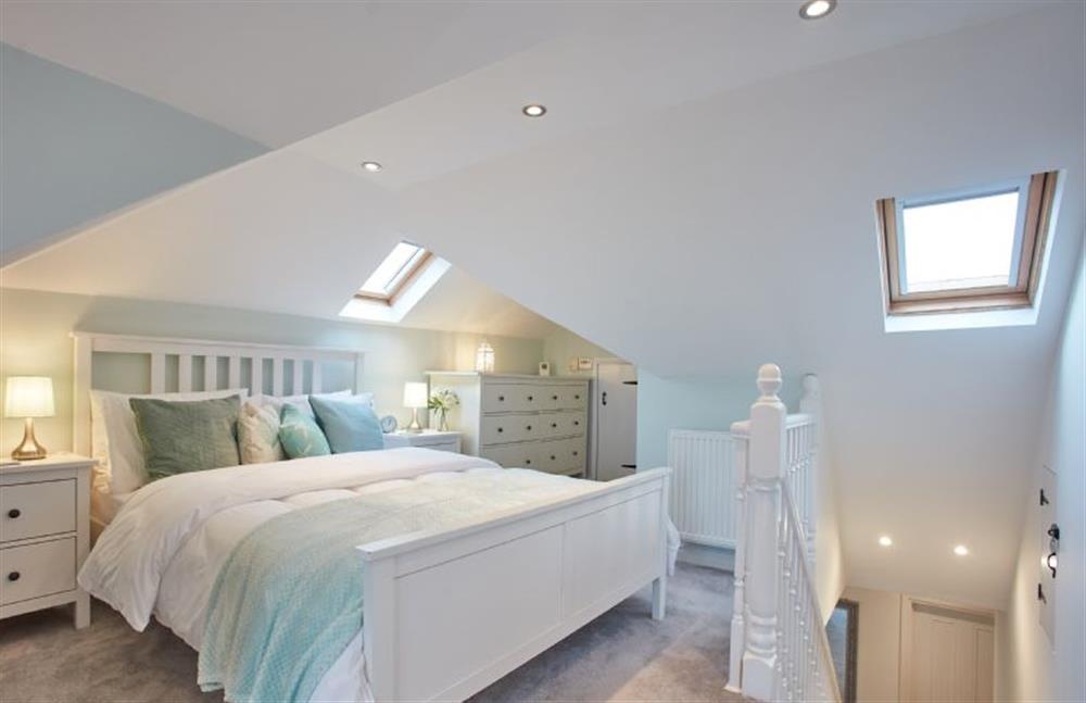 Tamarisk House, Cornwall: Bedroom one with a 5ft king-size bed, sea views with Juliet balcony and en-suite shower room