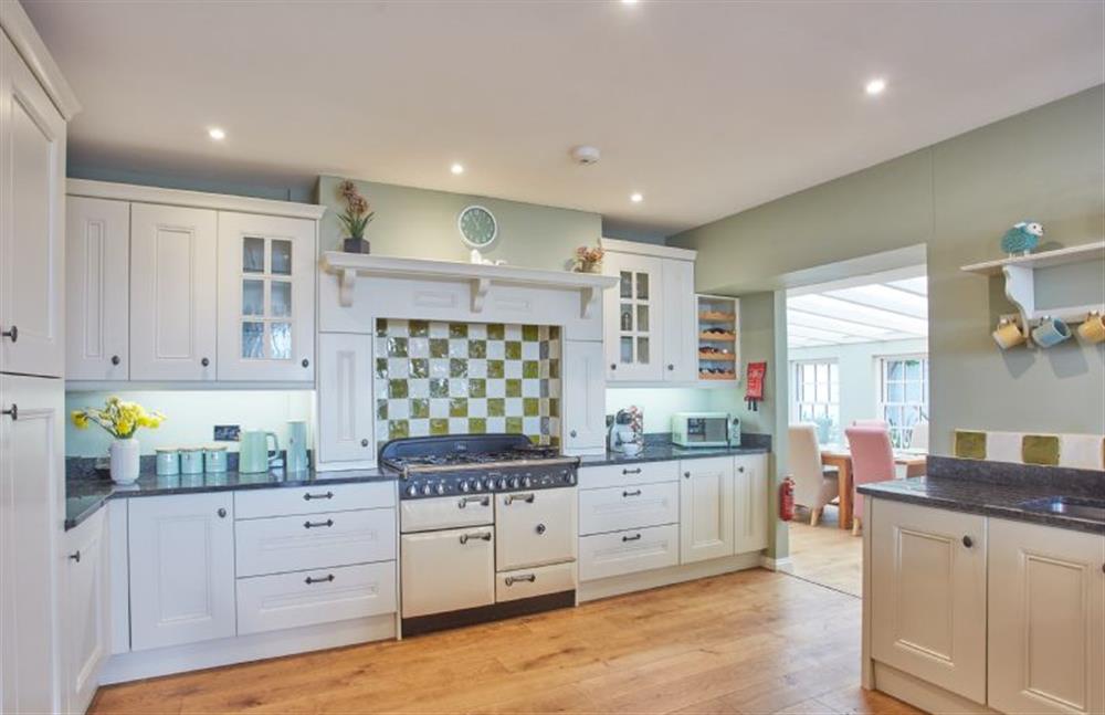 Tamarisk House, Cornwall: Kitchen with range cooker, breakfast bar, dishwasher, fridge/freezer and comfortable seating area (photo 2)