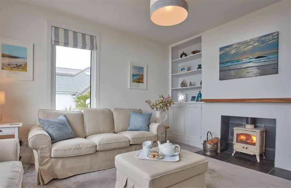Tamarisk House, Cornwall: Sitting room with seating for guests and a wood burning stove