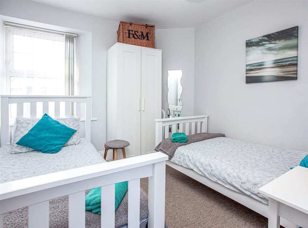 Modern comfortable twin room at Tamarisk in Torquay, Devon