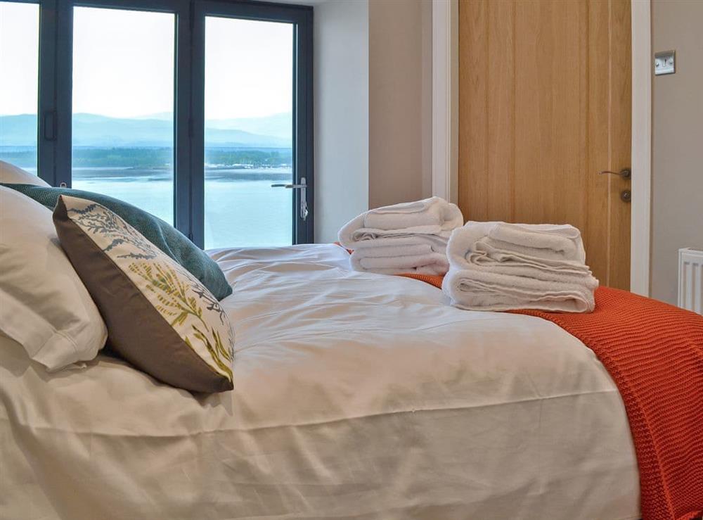 Welcoming double bedroom with fantastic views over the Menai Strait at Tan Y Fford in Glyngarth, near Beaumaris, Anglesey, Gwynedd