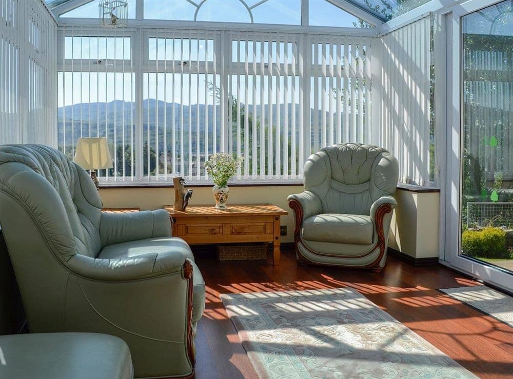 Sunny and bright conservatory at Tan Y Fownog in Penrhyndeudraeth, Gwynedd
