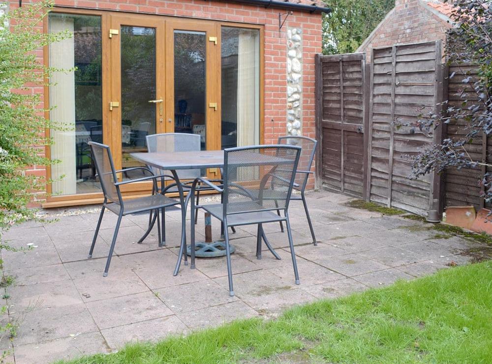 Patio area with outdoor furniture at Tanglewood in Norwich, Norfolk