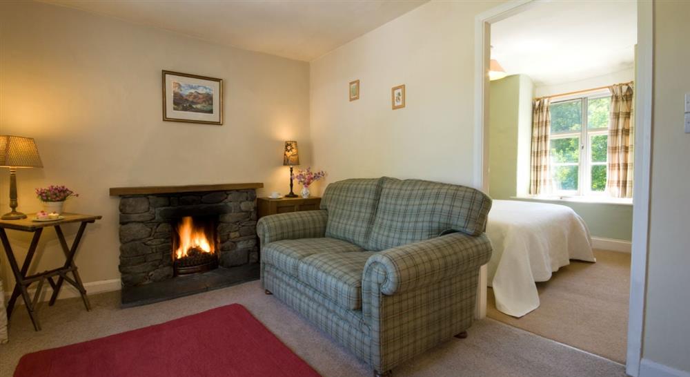 The cosy sitting room (photo 2) at Tanner Brow in Nr Hawkshead, Cumbria