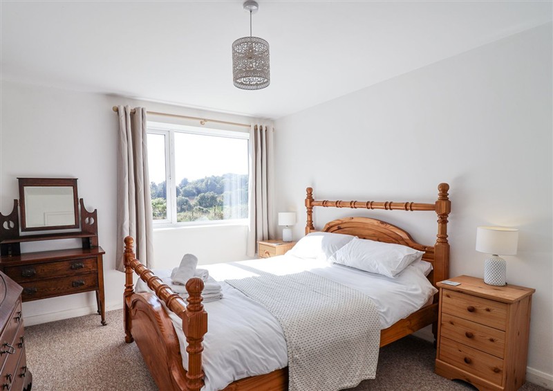 A bedroom in Tapps Lodge at Tapps Lodge, Brixton near Yealmpton