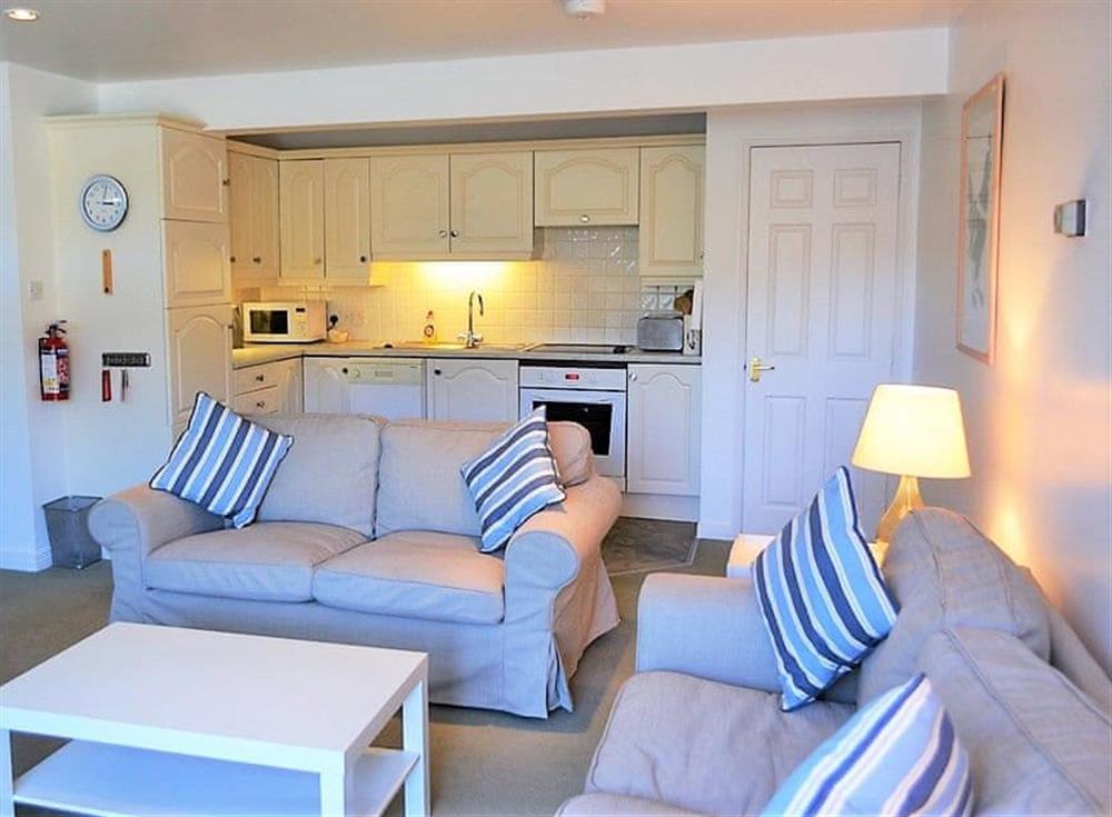 The open plan living area and kitchen at Tarquins in Fowey, Cornwall