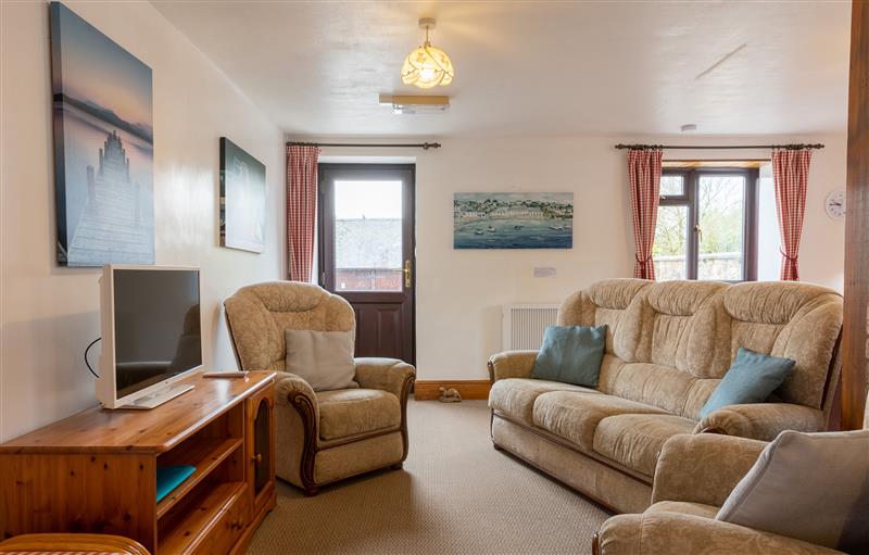Enjoy the living room (photo 2) at Tarquol Cottage, Torrington