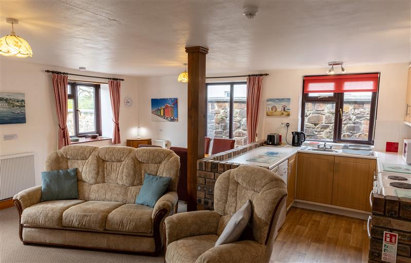 Enjoy the living room at Tarquol Cottage, Torrington