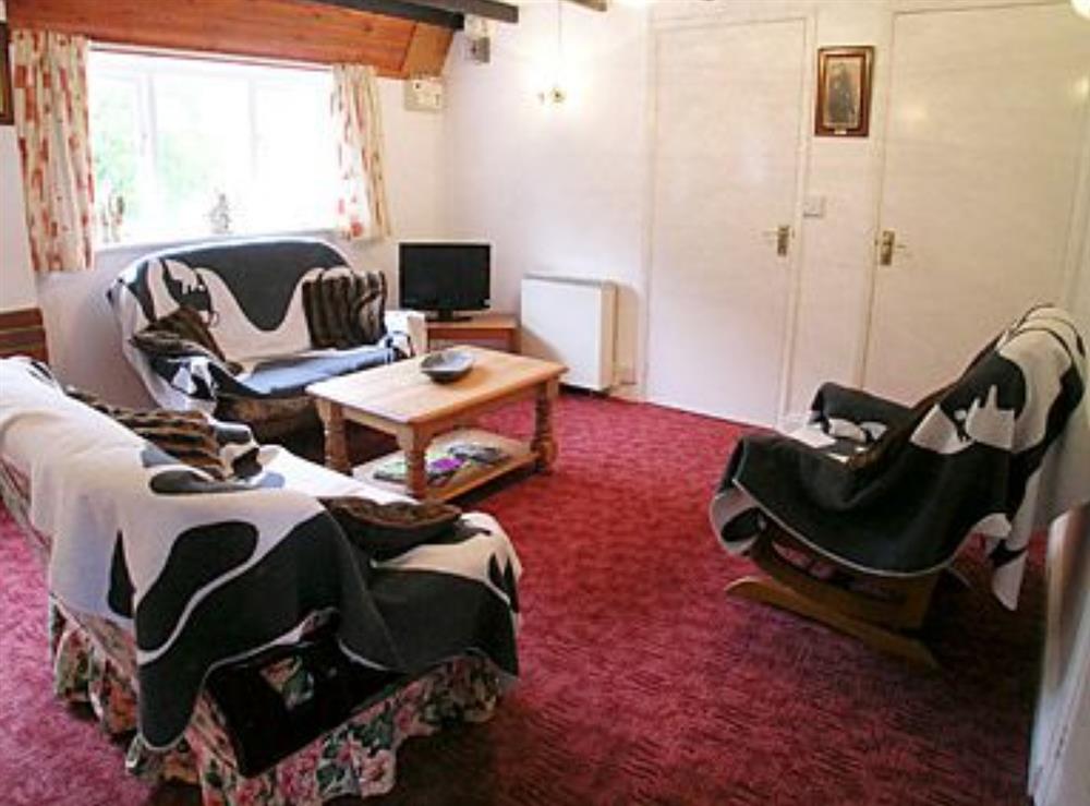 Living room/dining room at Tarrant Cottage in East Orchard, near Shaftesbury, Dorset