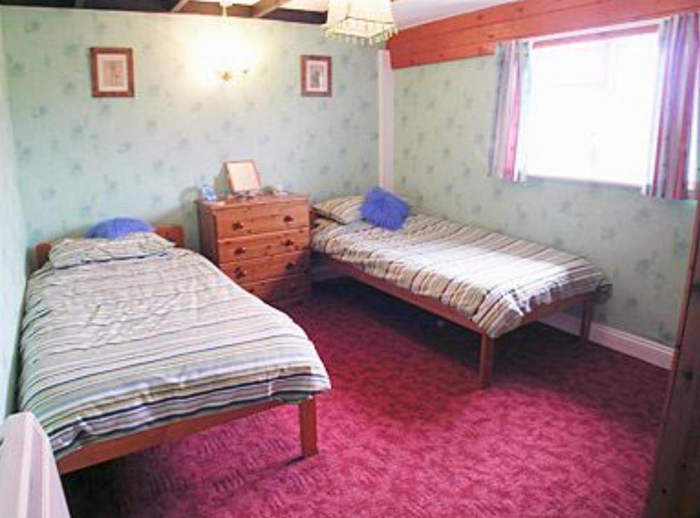 Twin bedroom at Tarrant Cottage in East Orchard, near Shaftesbury, Dorset