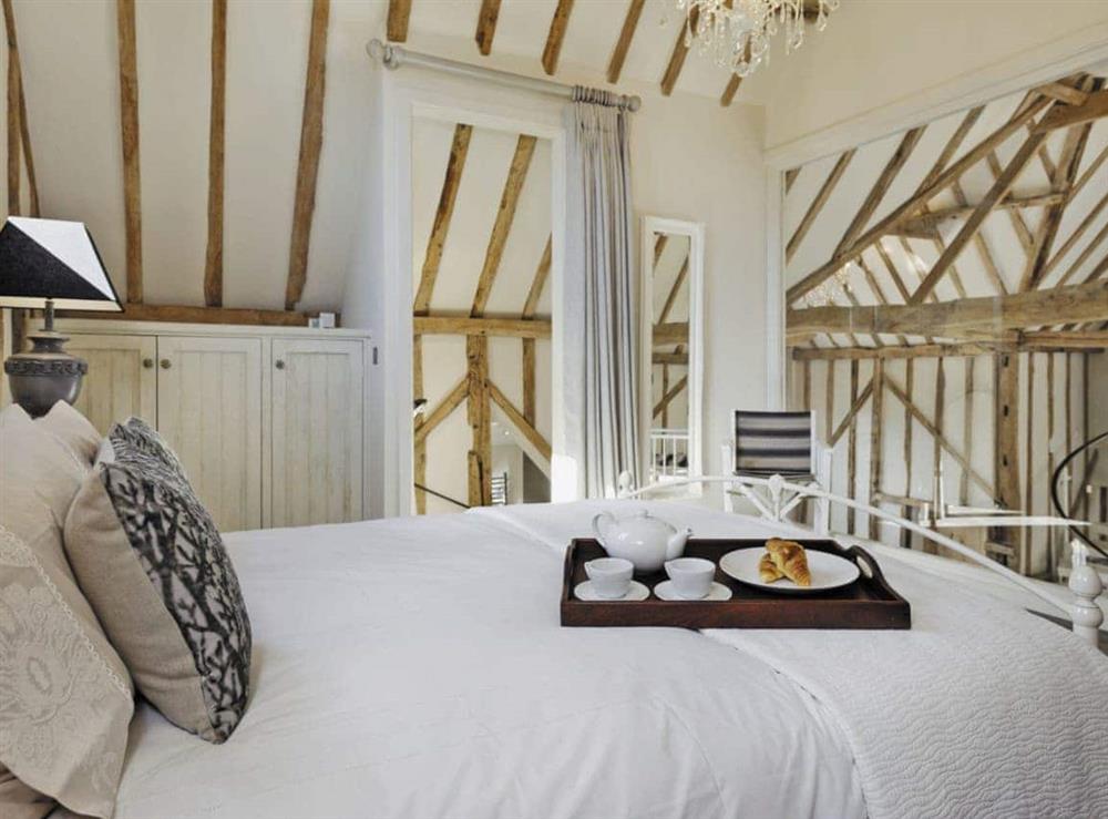 Beautifully presented gallery style double bedroom (photo 2) at Tatters Barn in Coggeshall, near Braintree, Essex