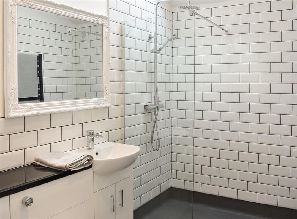 Fully tiled shower room at Poppy Lodge, 
