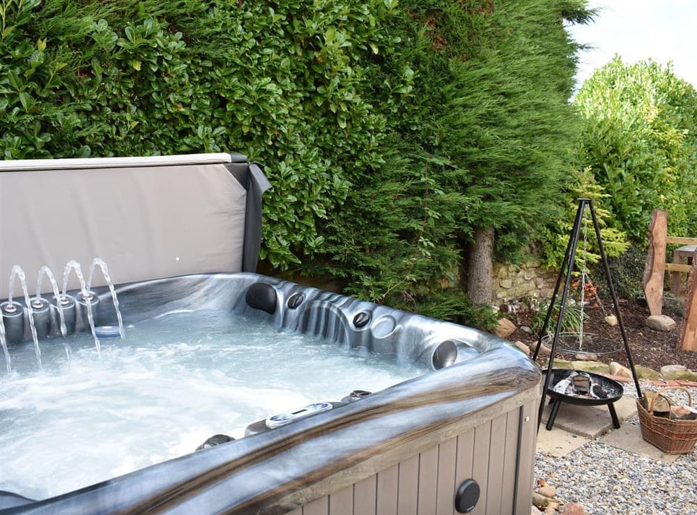 Secluded private hot tub at Poppy Lodge, 