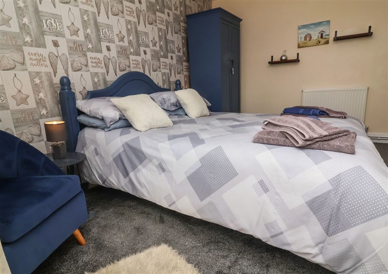 A bedroom in Tea Cosy Cottage at Tea Cosy Cottage, Marhamchurch