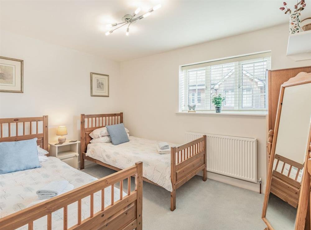 Twin bedroom at Tea Pot Cottage in Ringwood, Hampshire