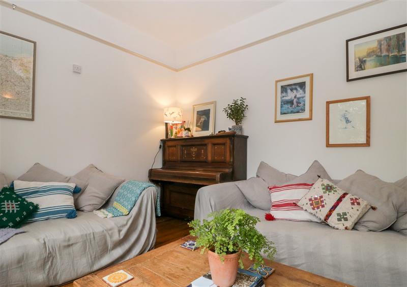 Relax in the living area at Teachers Cottage, Wiveliscombe