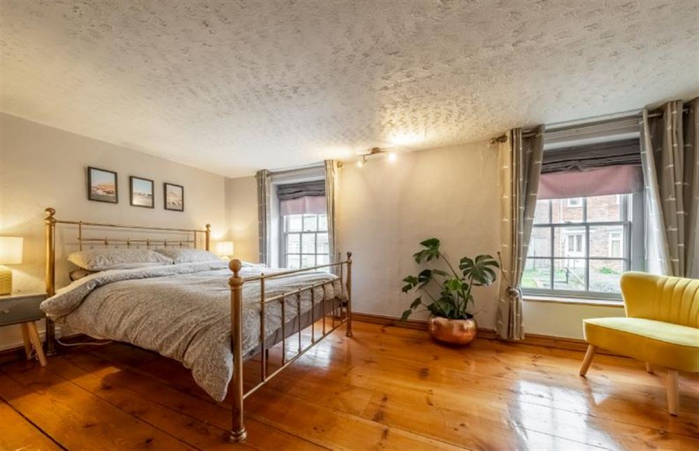 First floor: A spacious master bedroom at Teacup Cottage, Syderstone near Kings Lynn