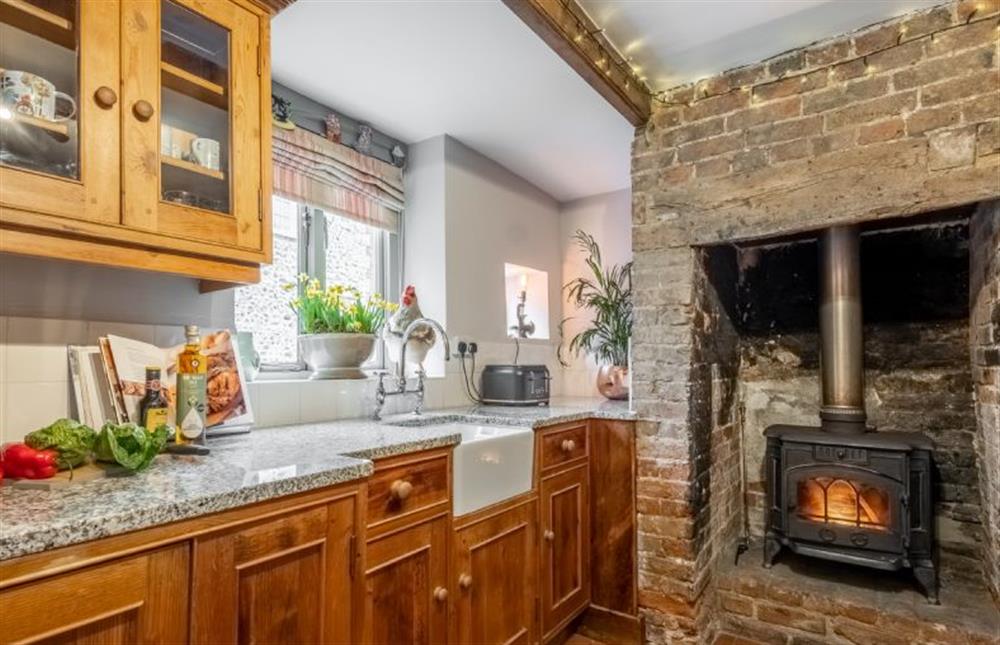 Ground floor: Kitchen with wood burning stove at Teacup Cottage, Syderstone near Kings Lynn