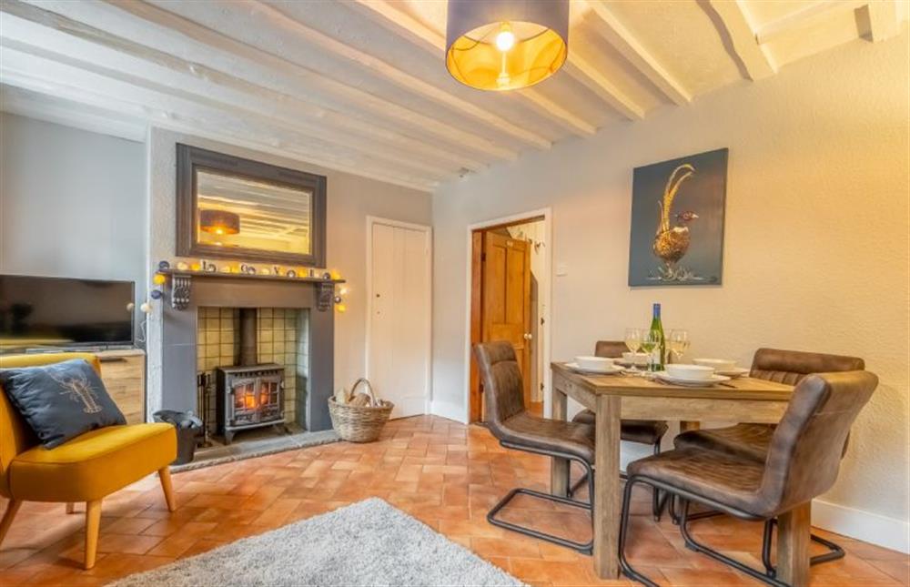 Ground floor: Sitting room with multi fuel stove and Smart television at Teacup Cottage, Syderstone near Kings Lynn