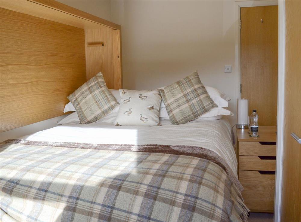 Double bed, all items on the desk untouched when converted at Teal in Holmfirth, West Yorkshire
