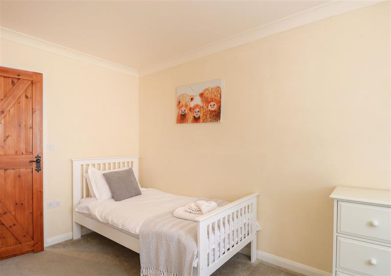 One of the 4 bedrooms at Teasel Cottage, Stalham