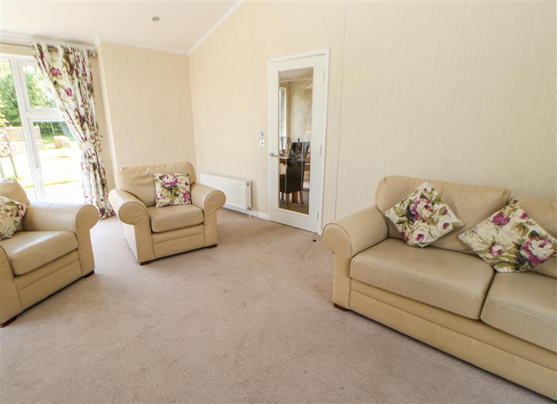 Relax in the living area at Teesdale Lodge, Hutton Rudby