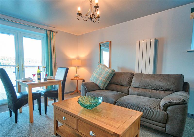Relax in the living area at Tegid Lakeside Apartment, Bala