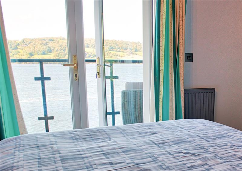 This is a bedroom at Tegid Lakeside Apartment, Bala