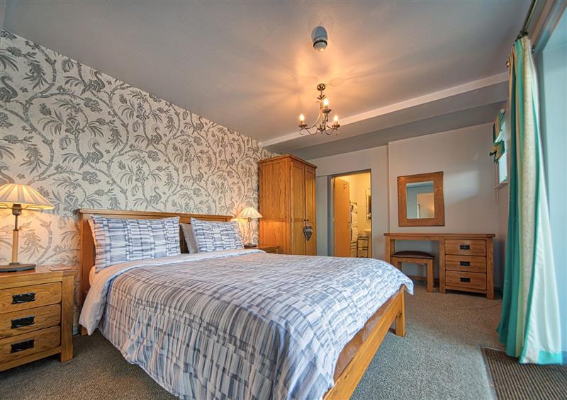 This is the bedroom at Tegid Lakeside Apartment, Bala