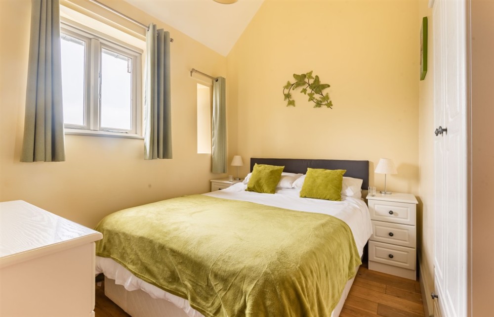 A bedroom in Teign Cottage at Teign Cottage in Broadhempston