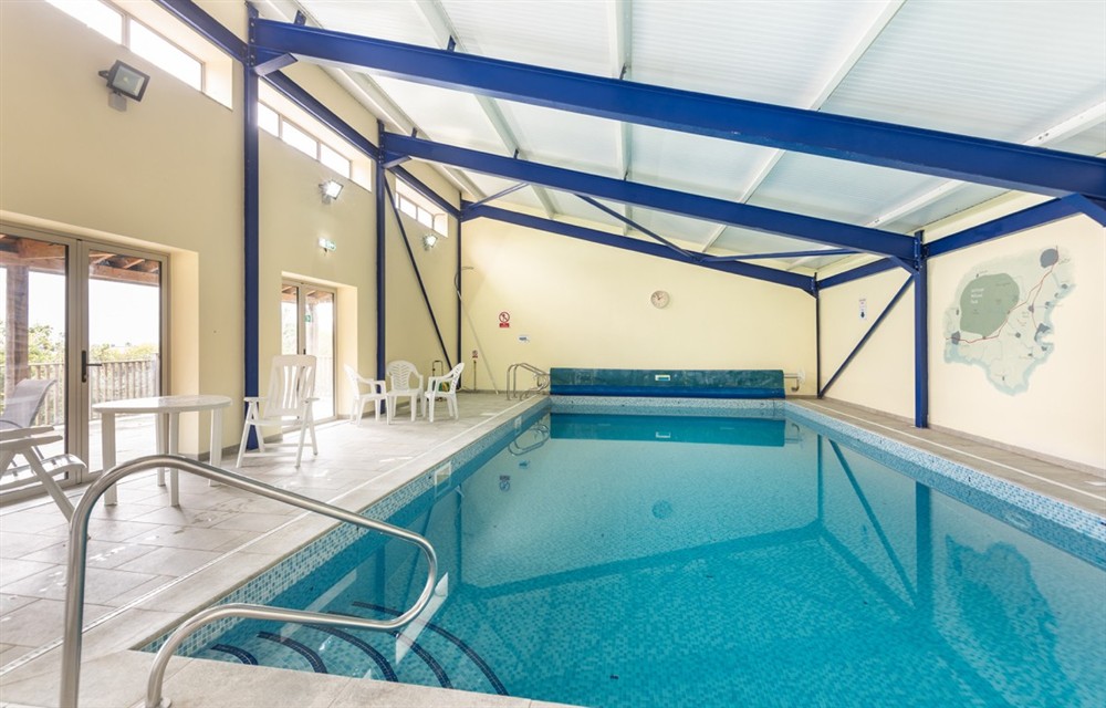 There is a swimming pool (photo 2) at Teign Cottage in Broadhempston