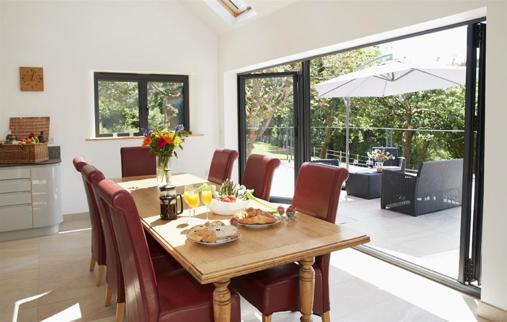 Dining table and chairs seating seven guests at Teign Vale, Drewsteignton