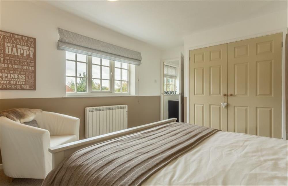 First Floor: Master bedroom with double wardrobes at Telford Cottage, Foulsham near Dereham