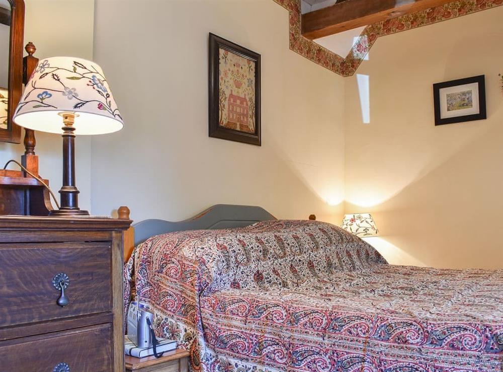 Warm and welcoming double bedroom at Tetheran Cottage in Marrick, near Reeth, North Yorkshire