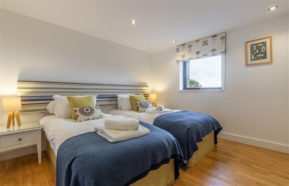 Bedroom three with twin single beds and sea views at Teyr Mor Cliff, Chapel Porth, St Agnes